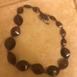 Body Shop necklace with medium brown beads.